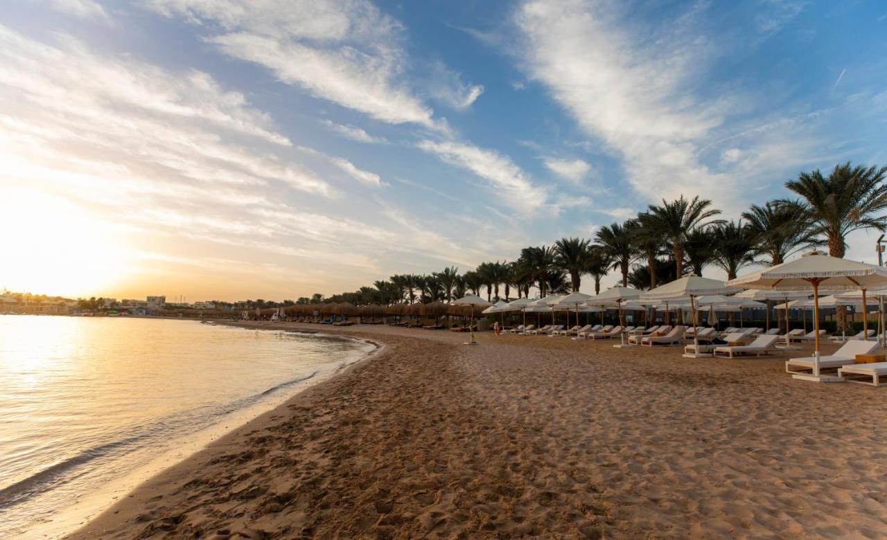 Sunrise Tucana Resort Grand Select Hurghada Exterior foto Sunset at the beach of the Hilton Sharm El Sheikh Resort